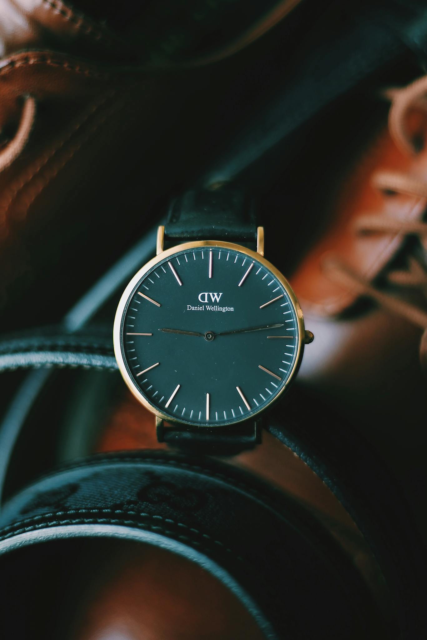 Home Close Up Of A Sleek Wristwatch Surrounded By
