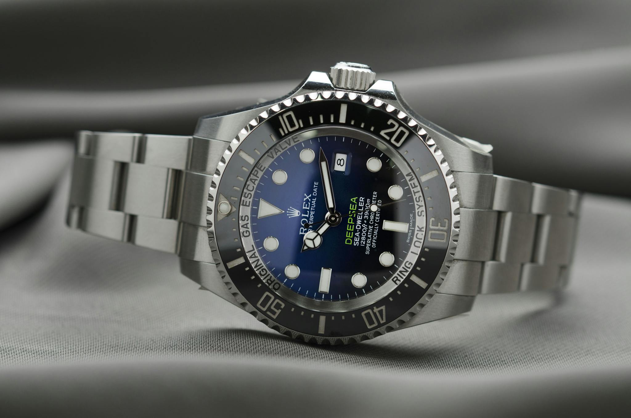 About High End Rolex Wristwatch Showcasing Precision Engineering And
